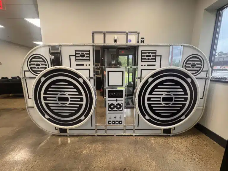 Giant Boom Box DJ booth rental featuring large speakers and retro design, ideal for events and parties, emphasizing EventFab's Pro-AV offerings.